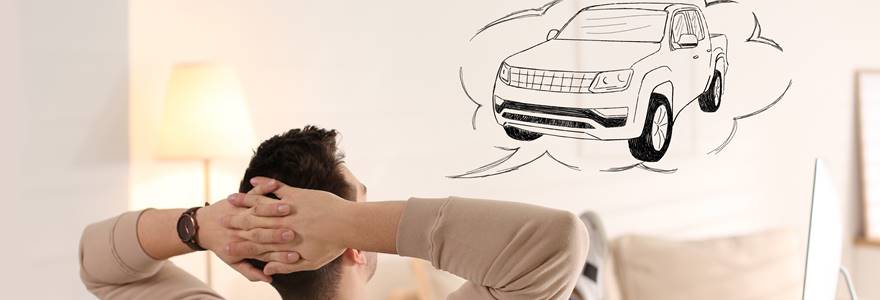 Homem sonhando com um carro novo