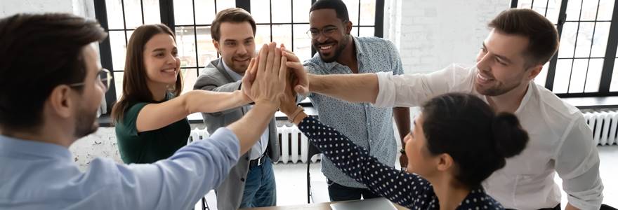 Overjoyed,Diverse,Businesspeople,Give,High,Five,Celebrate,Shared,Victory,Or
