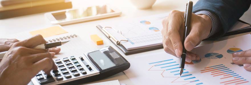 Business,Man,Analysis,On,Data,Paper,With,Business,Woman,Using